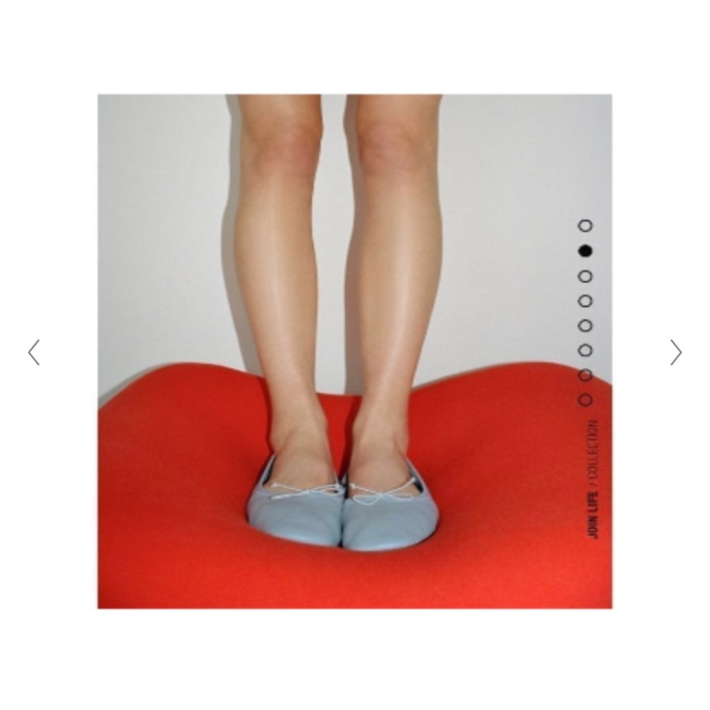 Blue Zara leather ballet flats.